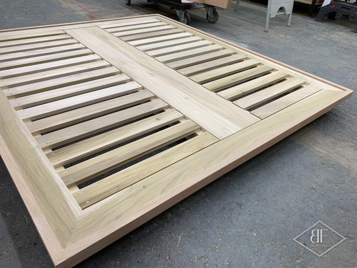 Solid oak slatted bed base assembled in the workshop before delivery