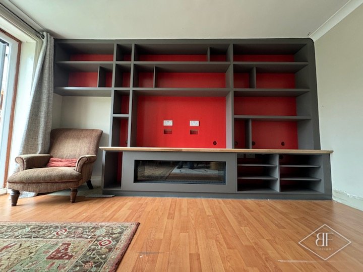 Media wall with fire and shelving