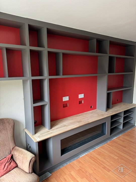 Media wall with shelving built by BFSuppliers
