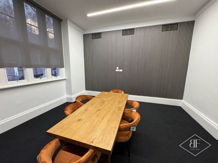 Charcoal slat feature wall in a boardroom