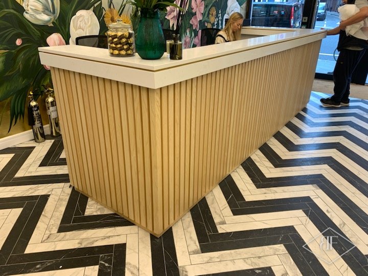 Slatted oak reception desk